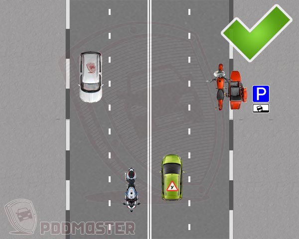 Стоянка мотоцикла на тротуаре