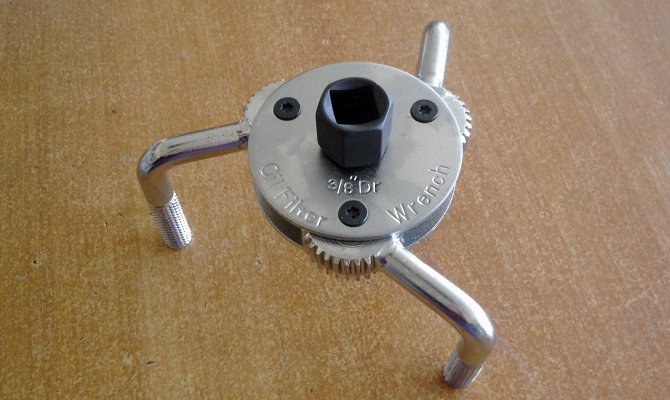 Универсальный «краб» для съема фильтрующего элемента